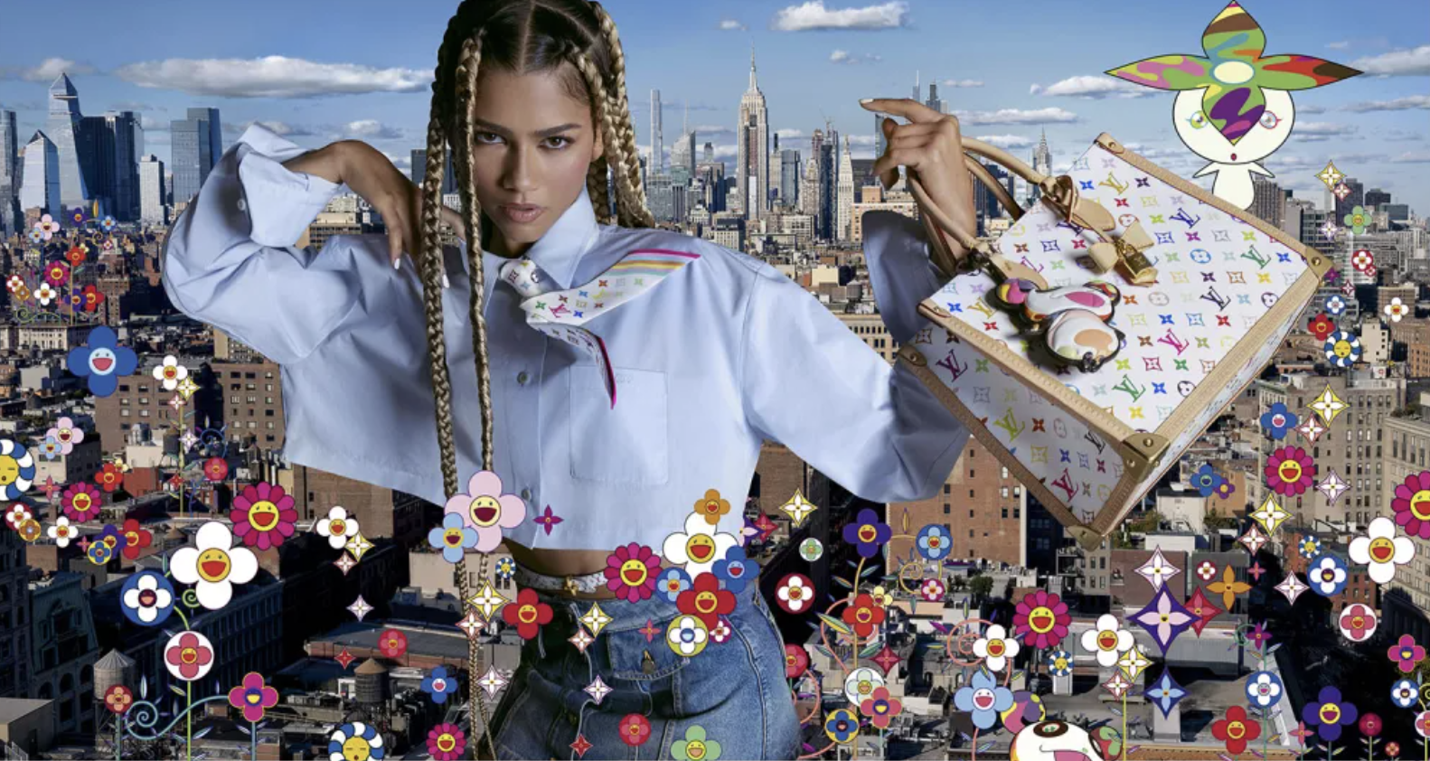 Zendaya holding a Louis Vuitton bag with Manhattan skyline